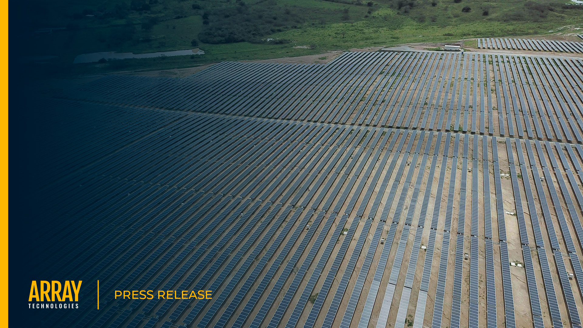 A press release cover image showing an aerial view of a solar site