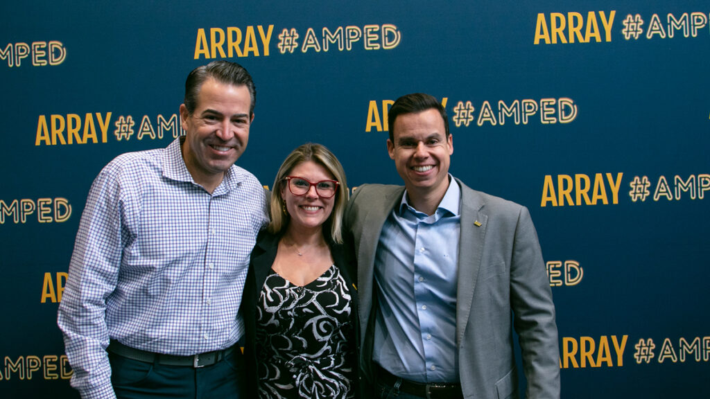 Camila Fernanda de Carvalho (center) with Bill Curtis, Senior Director of Sales Excellence (left), and Vinicius Gibrail, General Director Array Latin America, at the inaugural Array Global Leadership Conference.