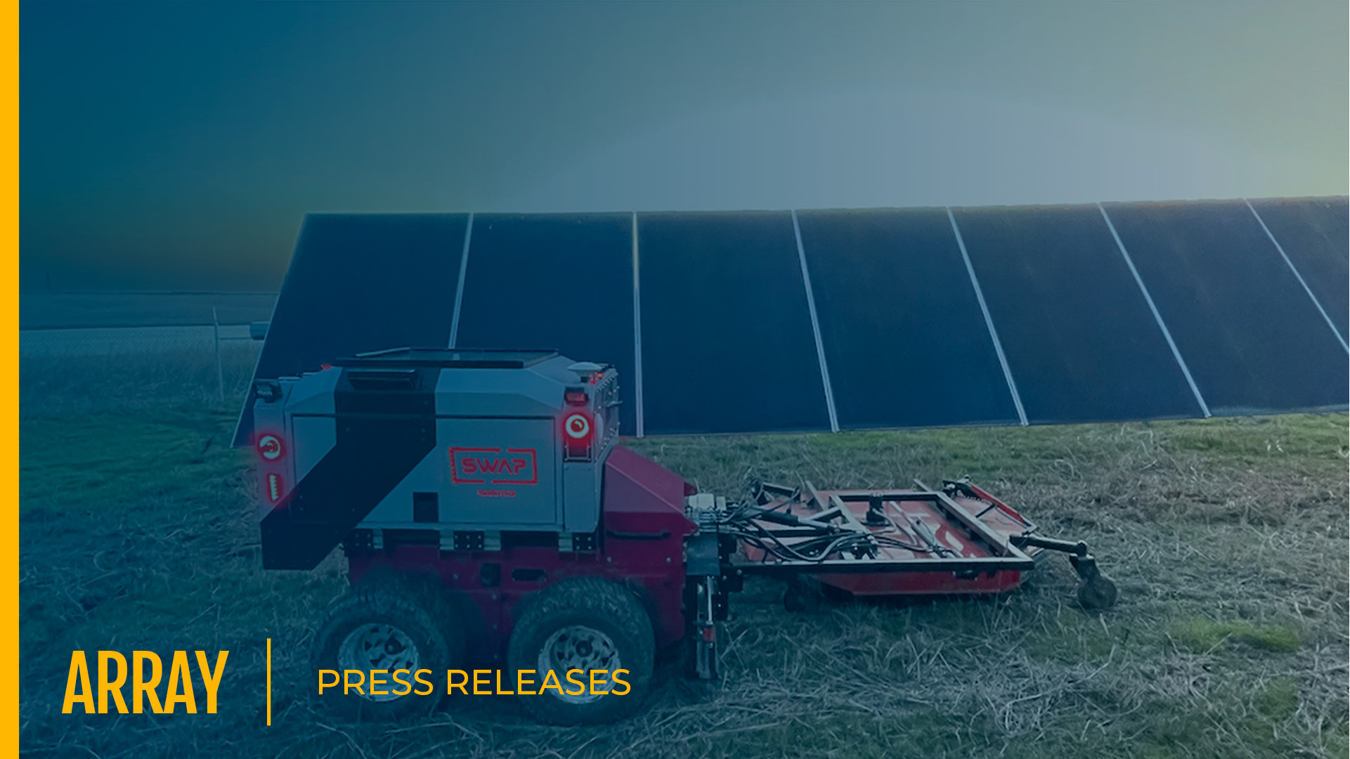 A Swap Robotics autonomous robot near a solar panel installation in a field, representing ARRAY's investment in solar automation technology.